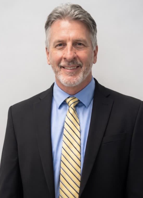 Russell Pait, Assistant Director / Compliance Officer